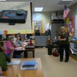 Students in Ilwaco Middle School review data from the Quake Catcher Network seismometer that was installed in their school after their teacher participated in a CEETEP workshop.